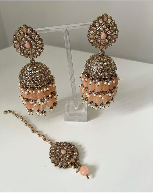 Peach Jhumka earrings with Tikka