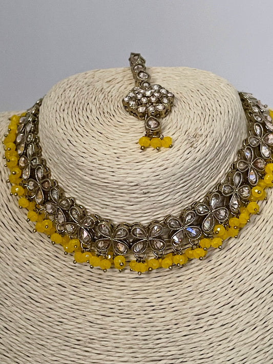 Yellow Polki Choker Set with Earrings and Tikka